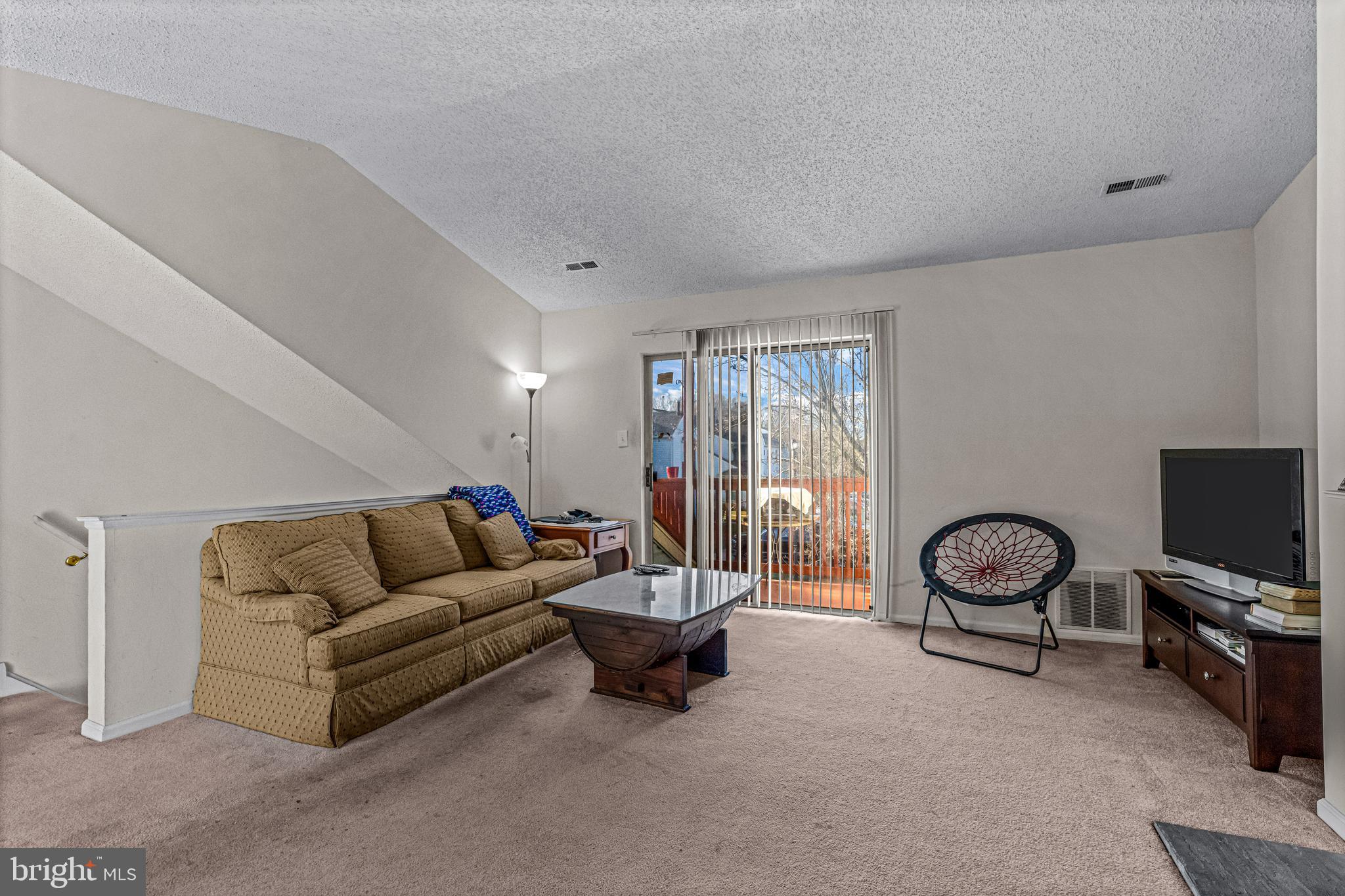 656 Covington Court Sewell, NJ 08080 - Photo 6 of 26 a living room with furniture and a flat screen tv