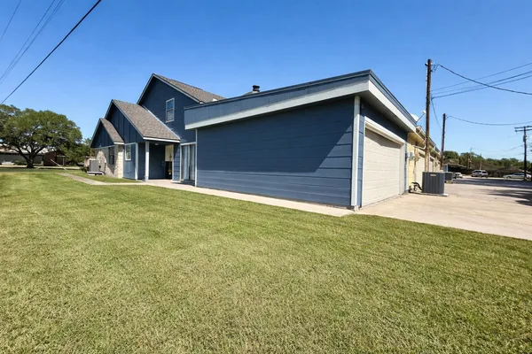 a house view with a outdoor space