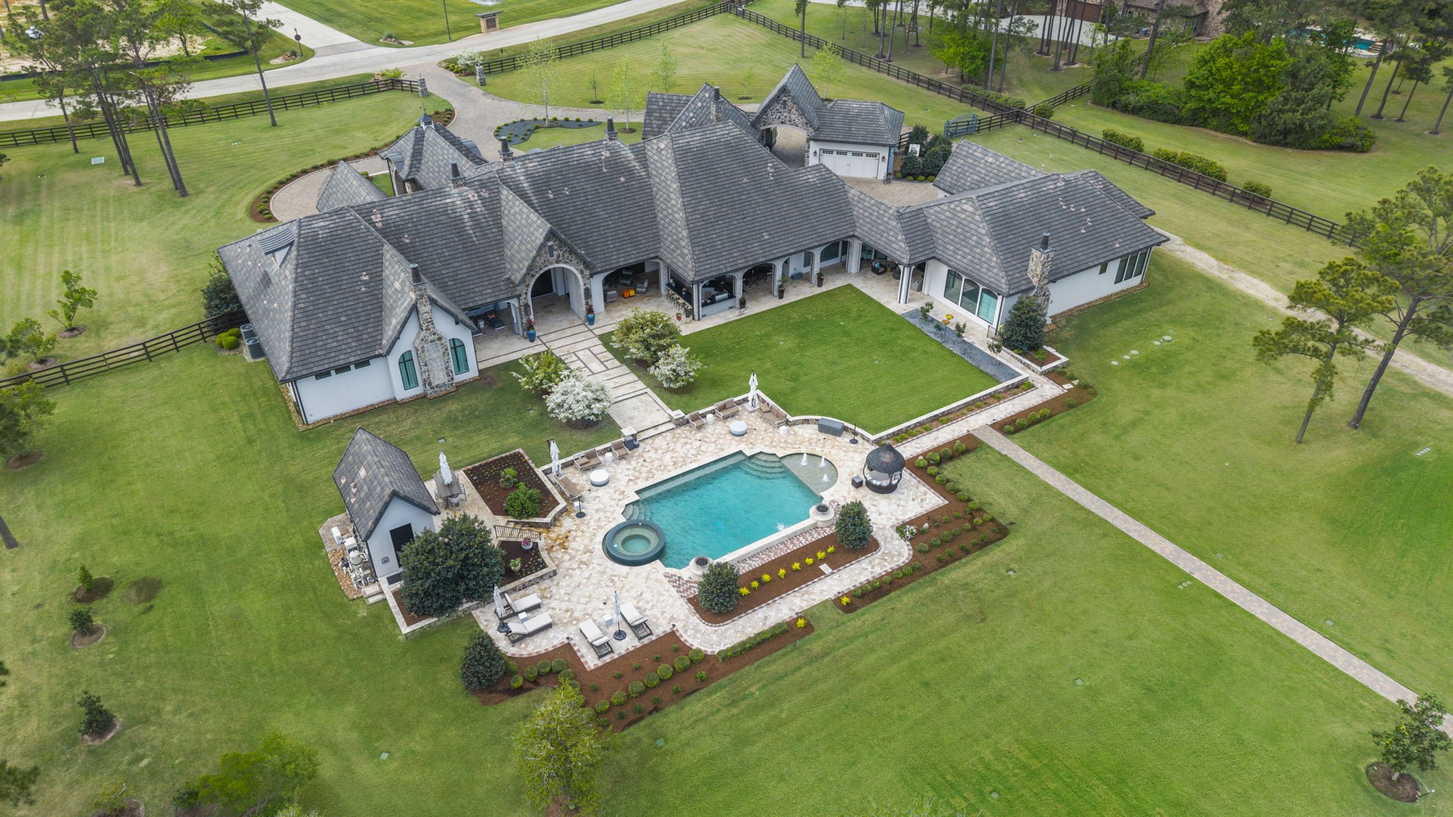 5 Willowcreek Ranch Road Tomball, TX 77377 - Photo 2 of 50 Set on nearly 6 fully fenced acres