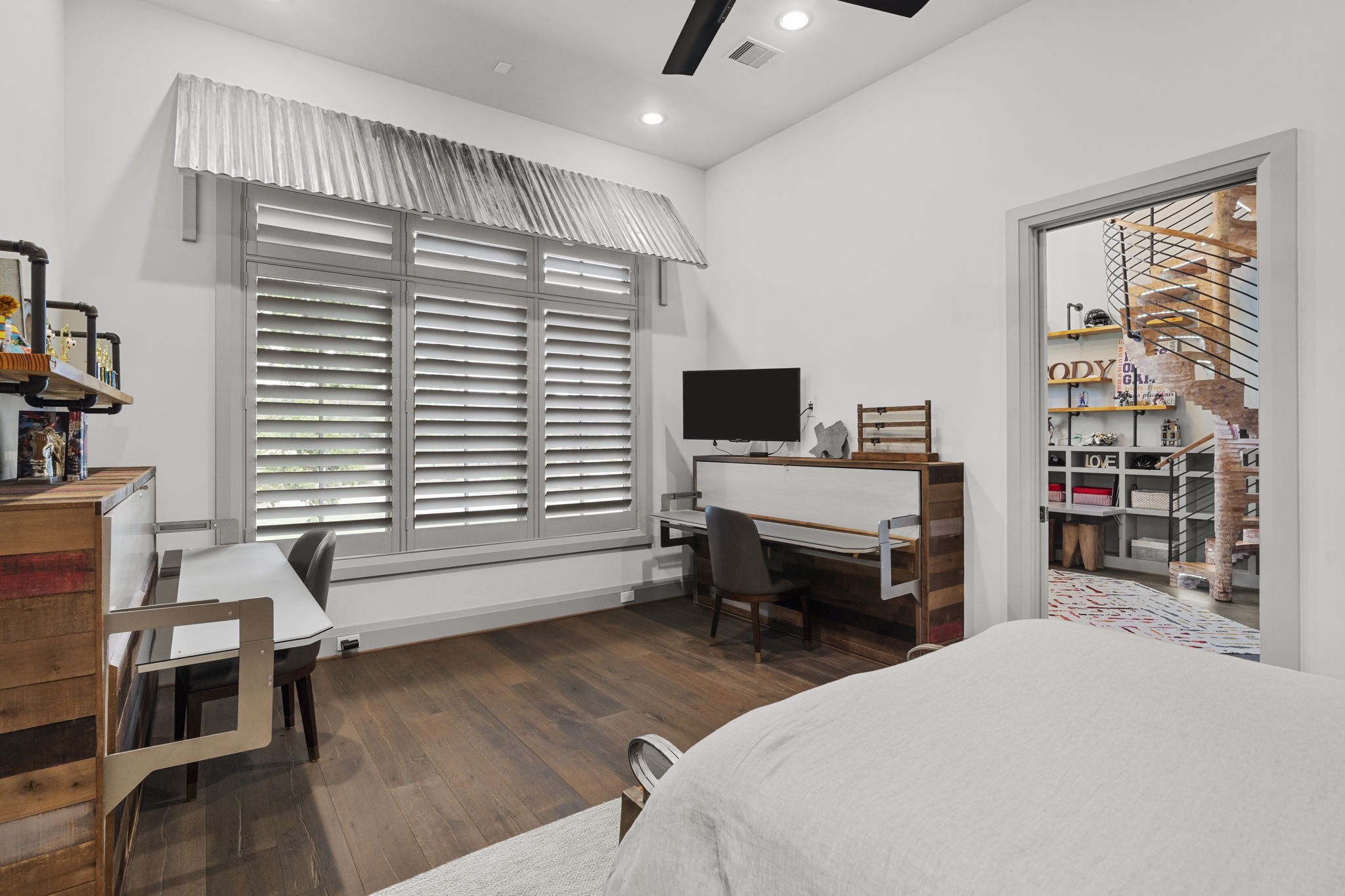 5 Willowcreek Ranch Road Tomball, TX 77377 - Photo 26 of 50 Each secondary bedroom features its own distinct designer touch this one including two custom desks that convert into beds!