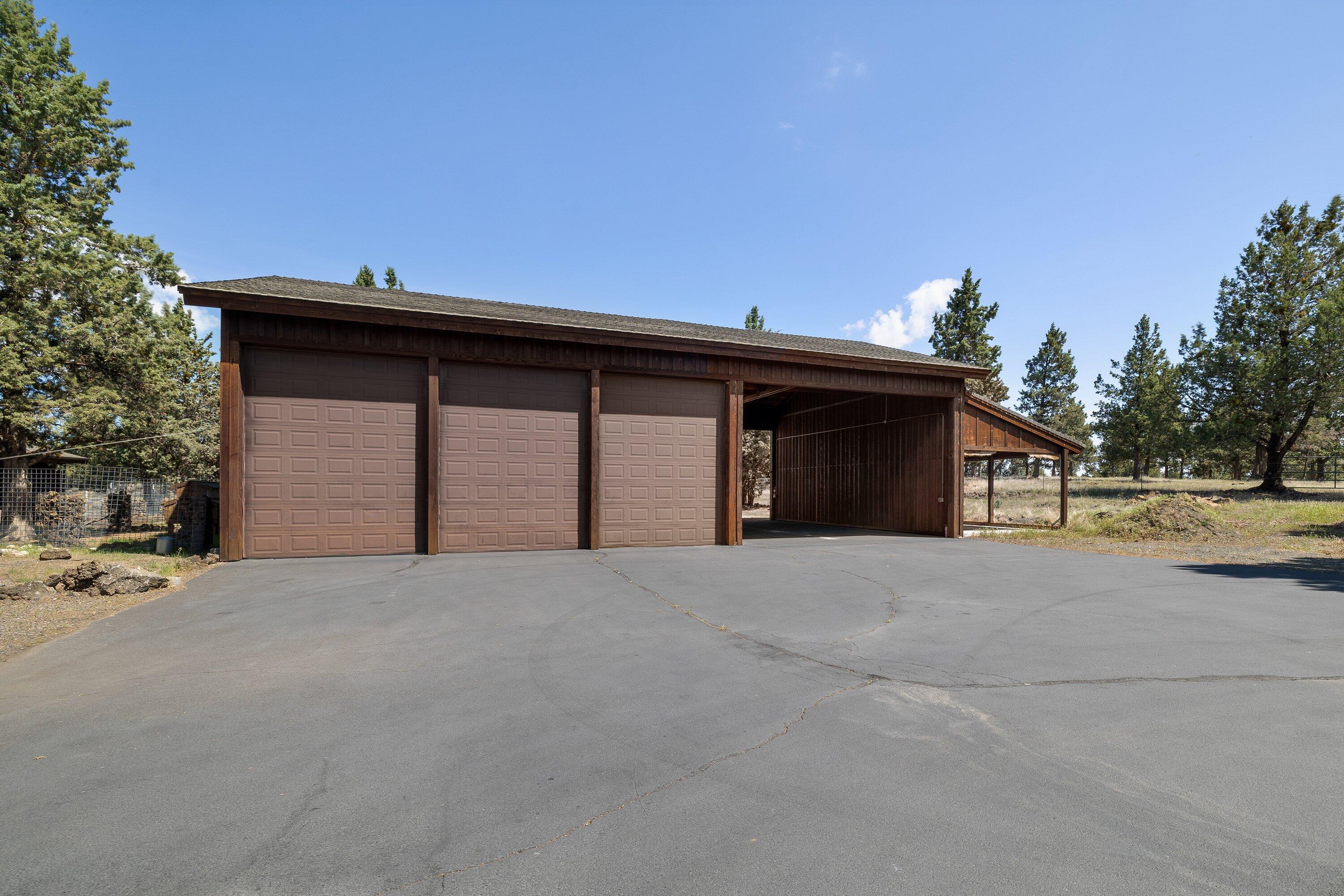 64155 Hunnell Road Bend, OR 97703 - Photo 59 of 96 Three bay shop with oversized doors and woodstove.