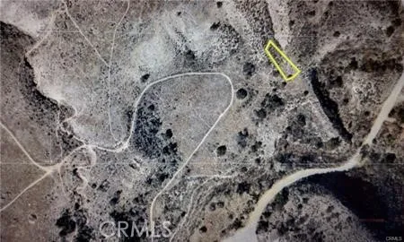 87 Crown Hill Drive Simi Valley, CA 93063 - Photo 4 of 5 a view of a dry plant in a garden