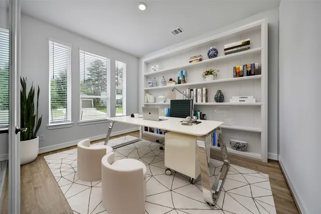 a kitchen with a sink and wooden cabinets