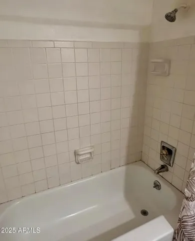 a bathroom with a bathtub
