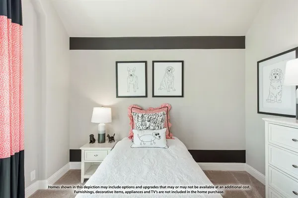 a picture of a bedroom with a bed and a table