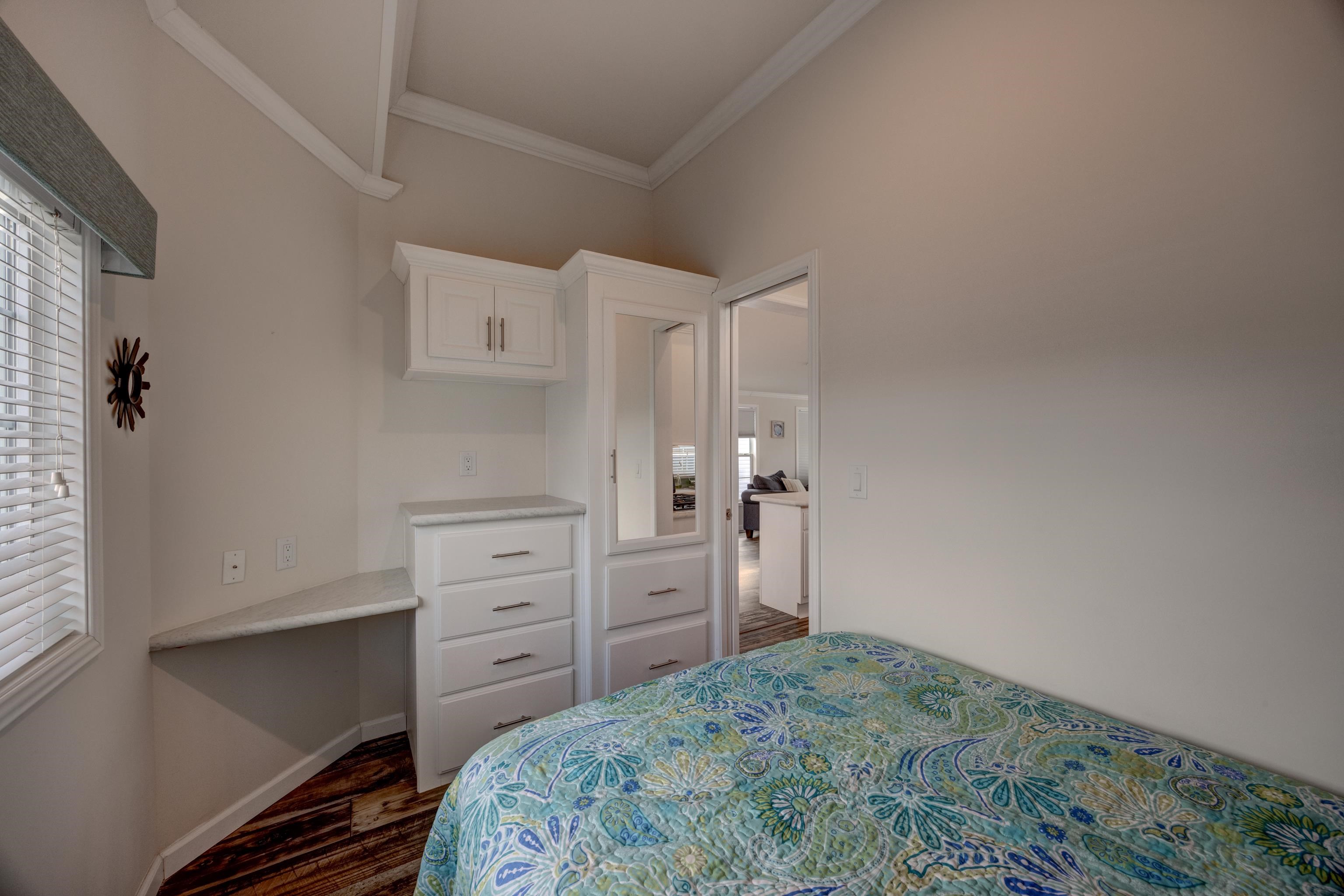 4100 Rte 9 South, Unit 96 Rio Grande, NJ 08242 - Photo 17 of 27 a bedroom with a cabinets and a dresser