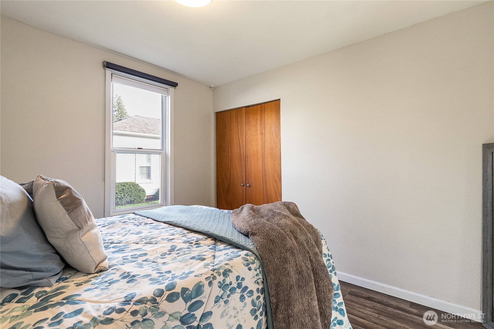 414 Edson Street Lynden, WA 98264 - Photo 12 of 32 a bedroom with a bed and a window