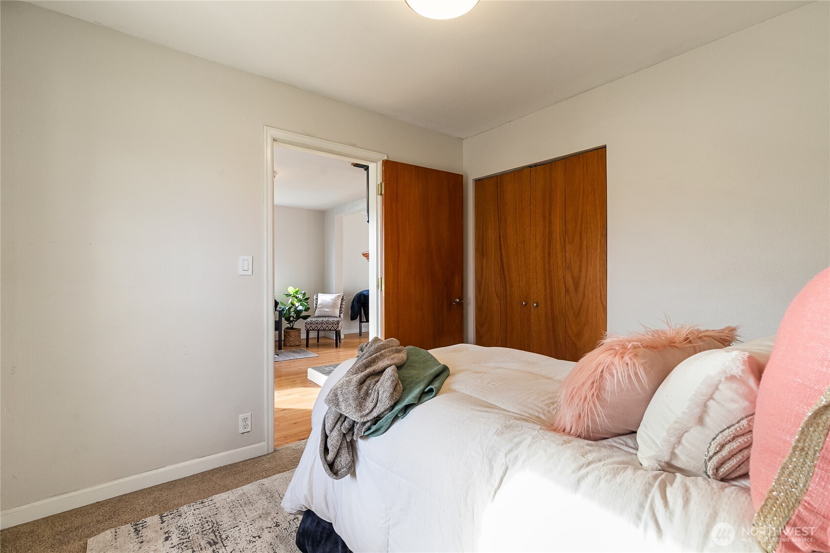 414 Edson Street Lynden, WA 98264 - Photo 14 of 32 a bedroom with a bed and a mirror