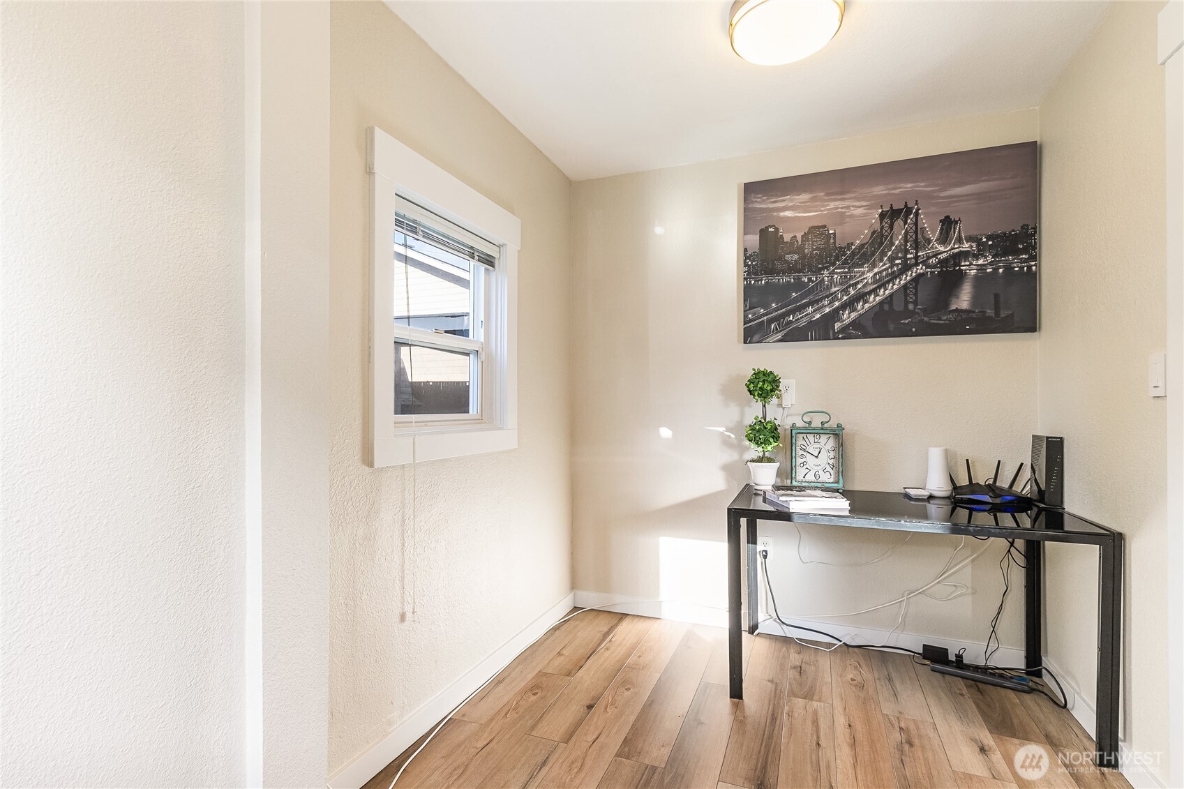 414 Edson Street Lynden, WA 98264 - Photo 19 of 32 a workspace with wooden floor