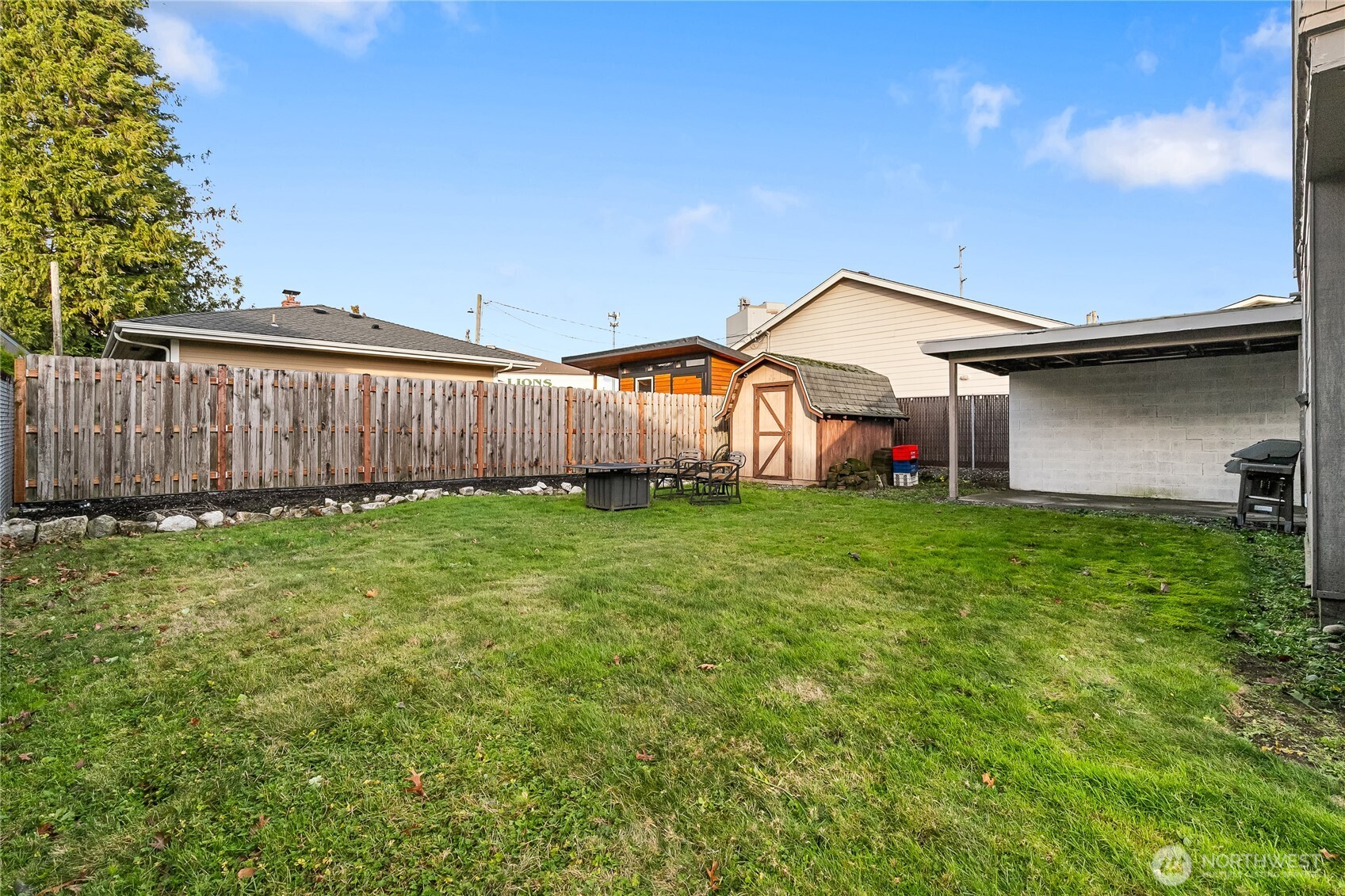414 Edson Street Lynden, WA 98264 - Photo 30 of 32 a front view of house with backyard and green space