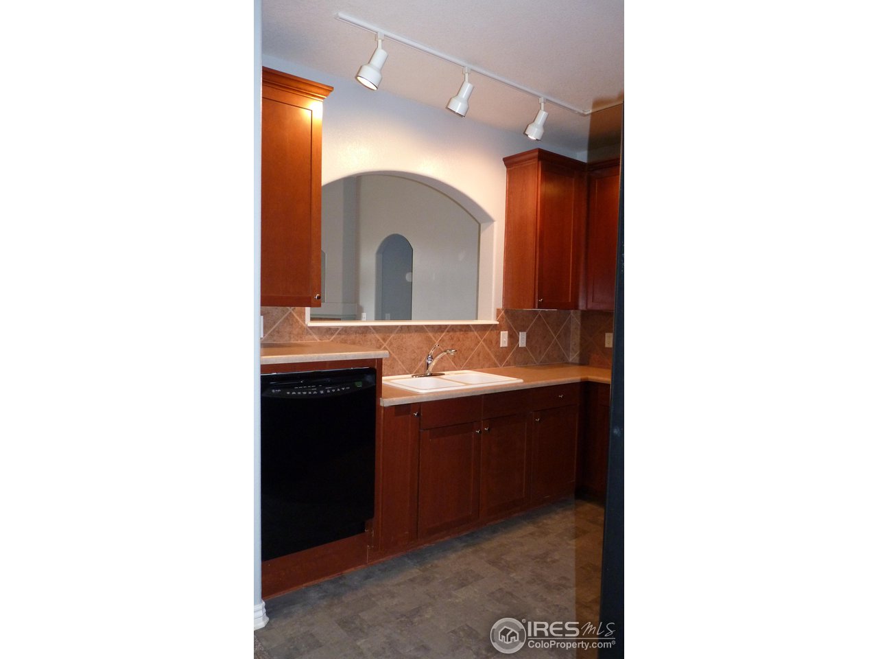 4672 West 20th Road, Unit 2224 Greeley, CO 80634 - Photo 3 of 16 Kitchen open rto family room