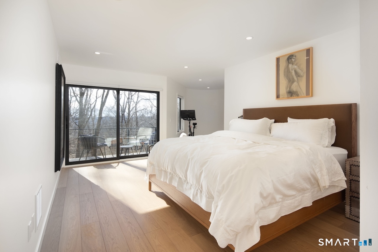 9 Overlook Drive Salisbury, CT 06039 - Photo 17 of 32 a large white bed in a white room