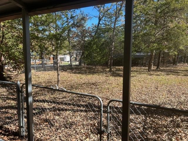 314 Blackjack Street Yantis, TX 75497 - Photo 11 of 26 a view of a backyard of the house