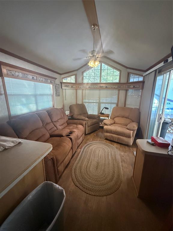 314 Blackjack Street Yantis, TX 75497 - Photo 13 of 26 a living room with furniture and a large window