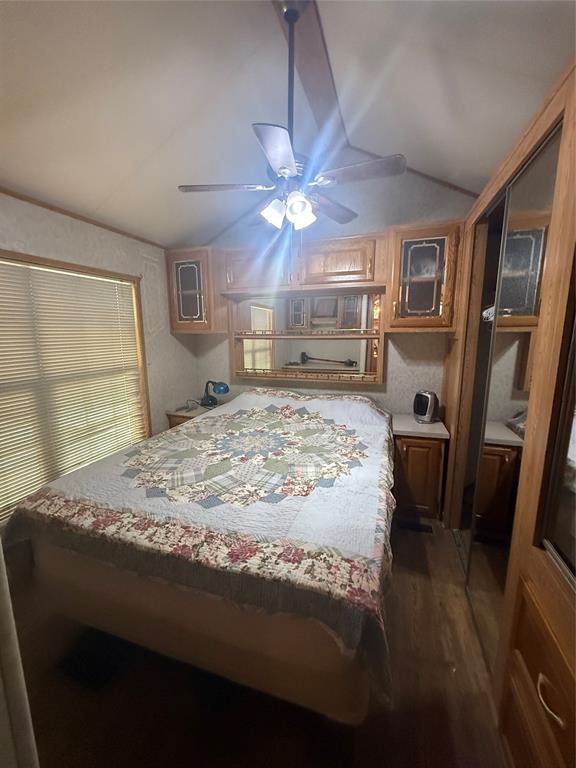 314 Blackjack Street Yantis, TX 75497 - Photo 15 of 26 a bed sitting in a room next to a window