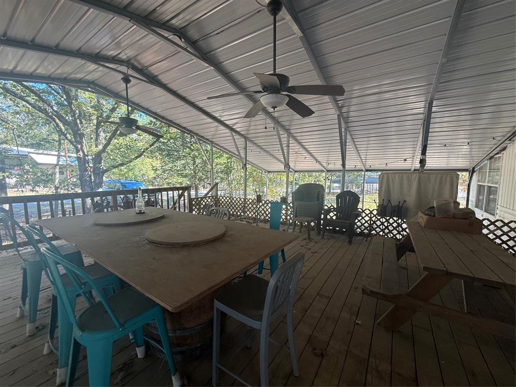 314 Blackjack Street Yantis, TX 75497 - Photo 17 of 26 a view of a outdoor space with table and chairs
