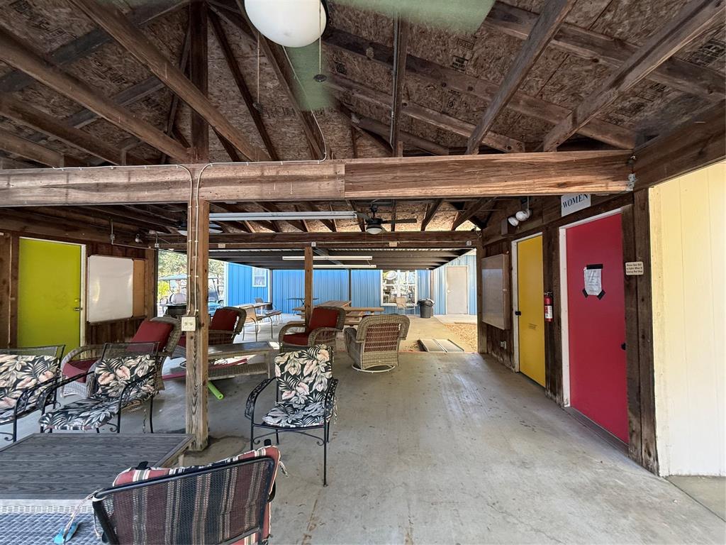 314 Blackjack Street Yantis, TX 75497 - Photo 21 of 26 a view of a chairs and tables in patio