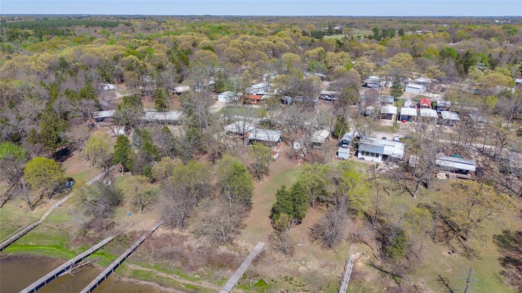 314 Blackjack Street Yantis, TX 75497 - Photo 23 of 26 a view of a yard with an outdoor space