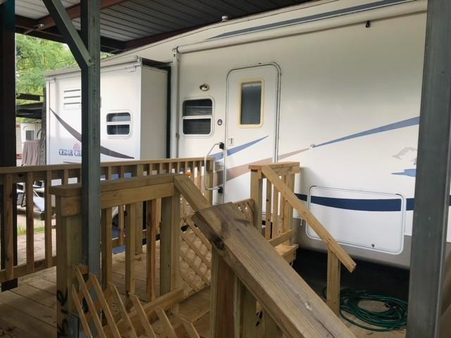 314 Blackjack Street Yantis, TX 75497 - Photo 9 of 26 a view of balcony with furniture and wooden floor