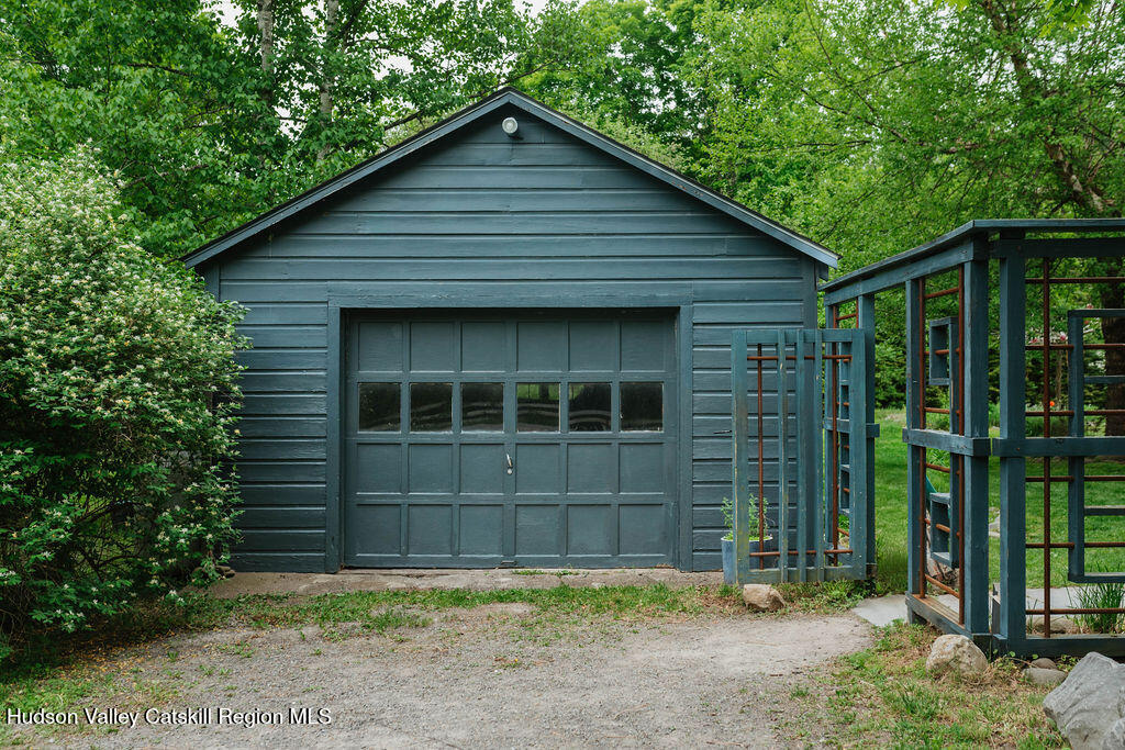 675 Cooper Lake Road Woodstock, NY 12448 - Photo 29 of 31 a front view of a house with a yard