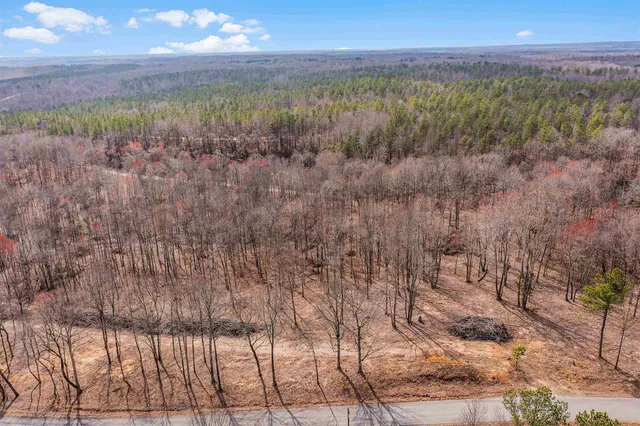 a view of a yard next to a yard