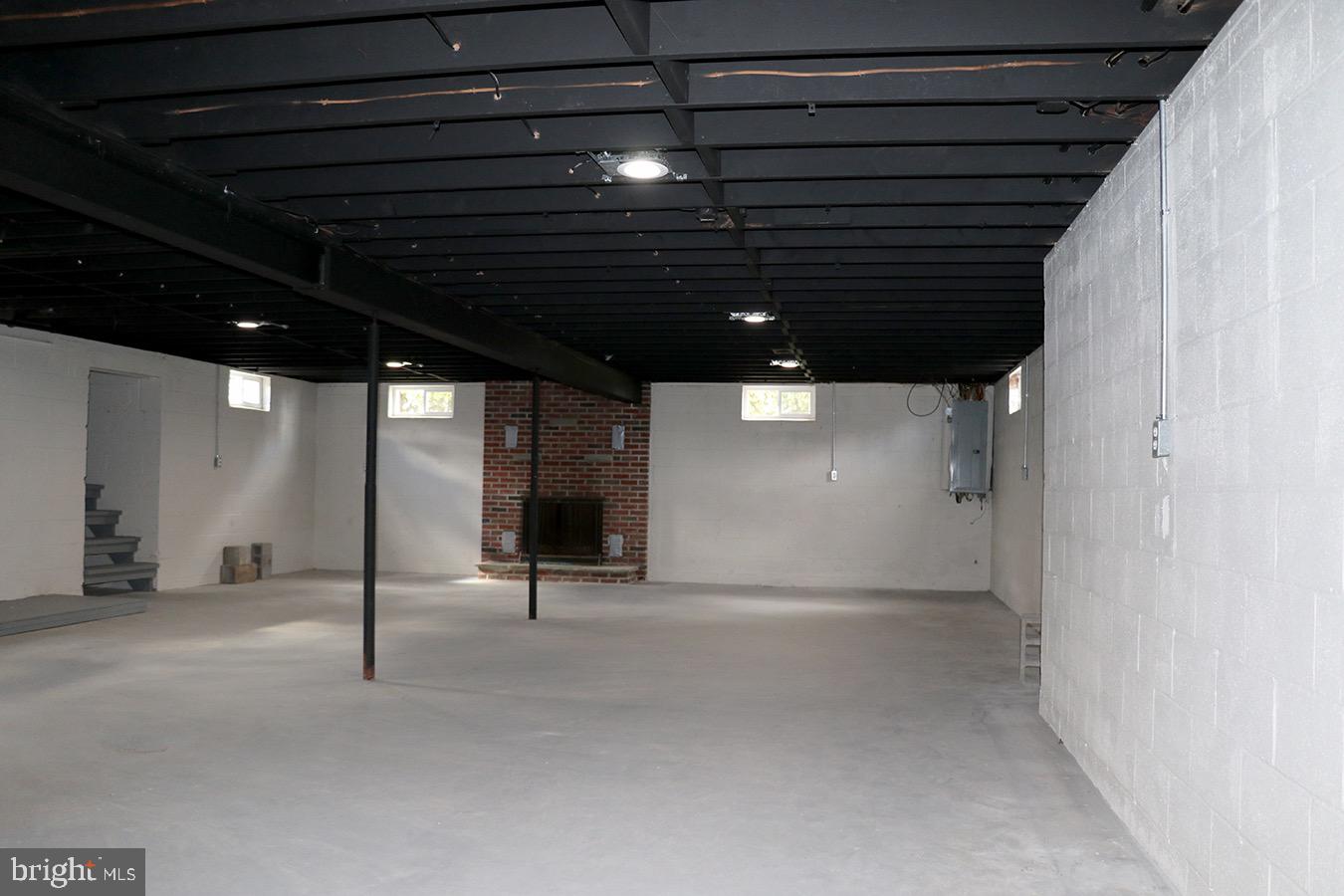 560 Mohns Hill Road Reading, PA 19608 - Photo 13 of 13 a view of an empty room with a fireplace
