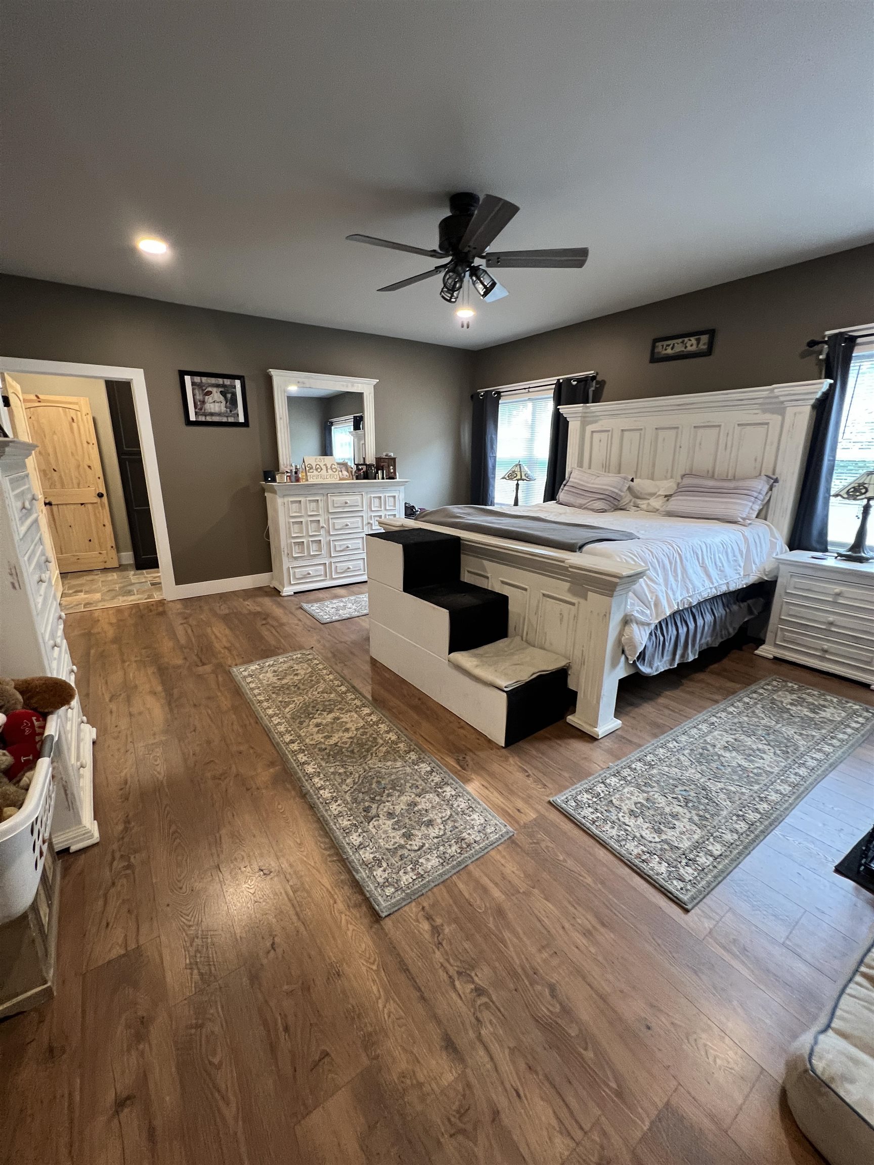 5205 Hamburg Road Michie, TN 38357 - Photo 14 of 40 a living room with a bed furniture and paintings on the wall