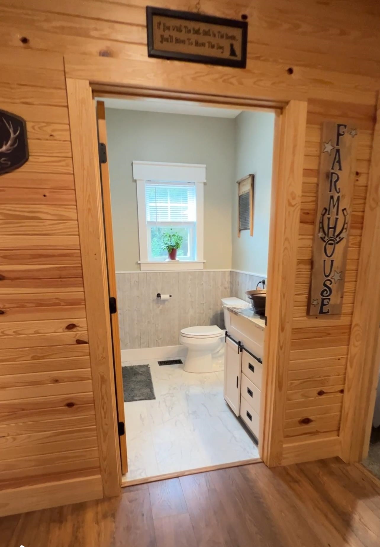 5205 Hamburg Road Michie, TN 38357 - Photo 19 of 40 a bathroom with a sink a toilet and shower