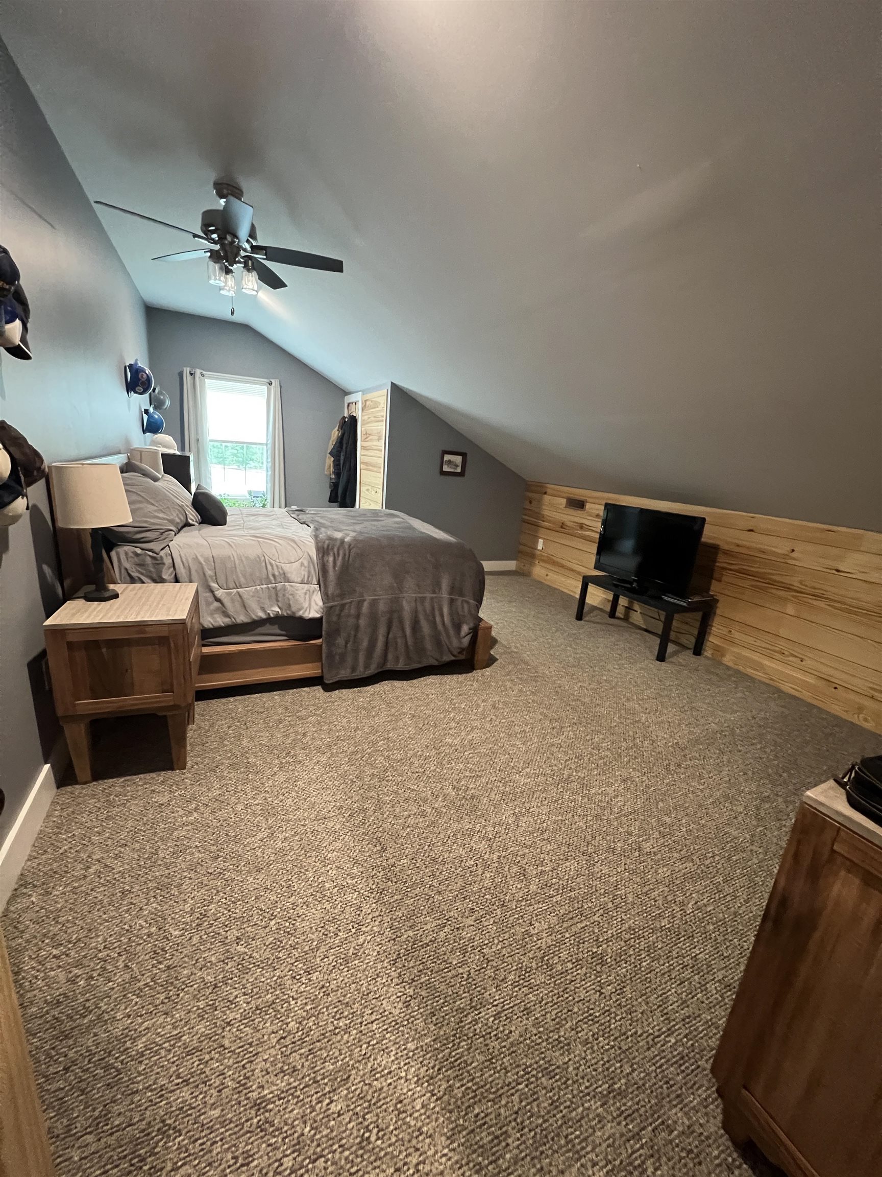 5205 Hamburg Road Michie, TN 38357 - Photo 23 of 40 Bedroom with lofted ceiling, carpet flooring, and ceiling fan