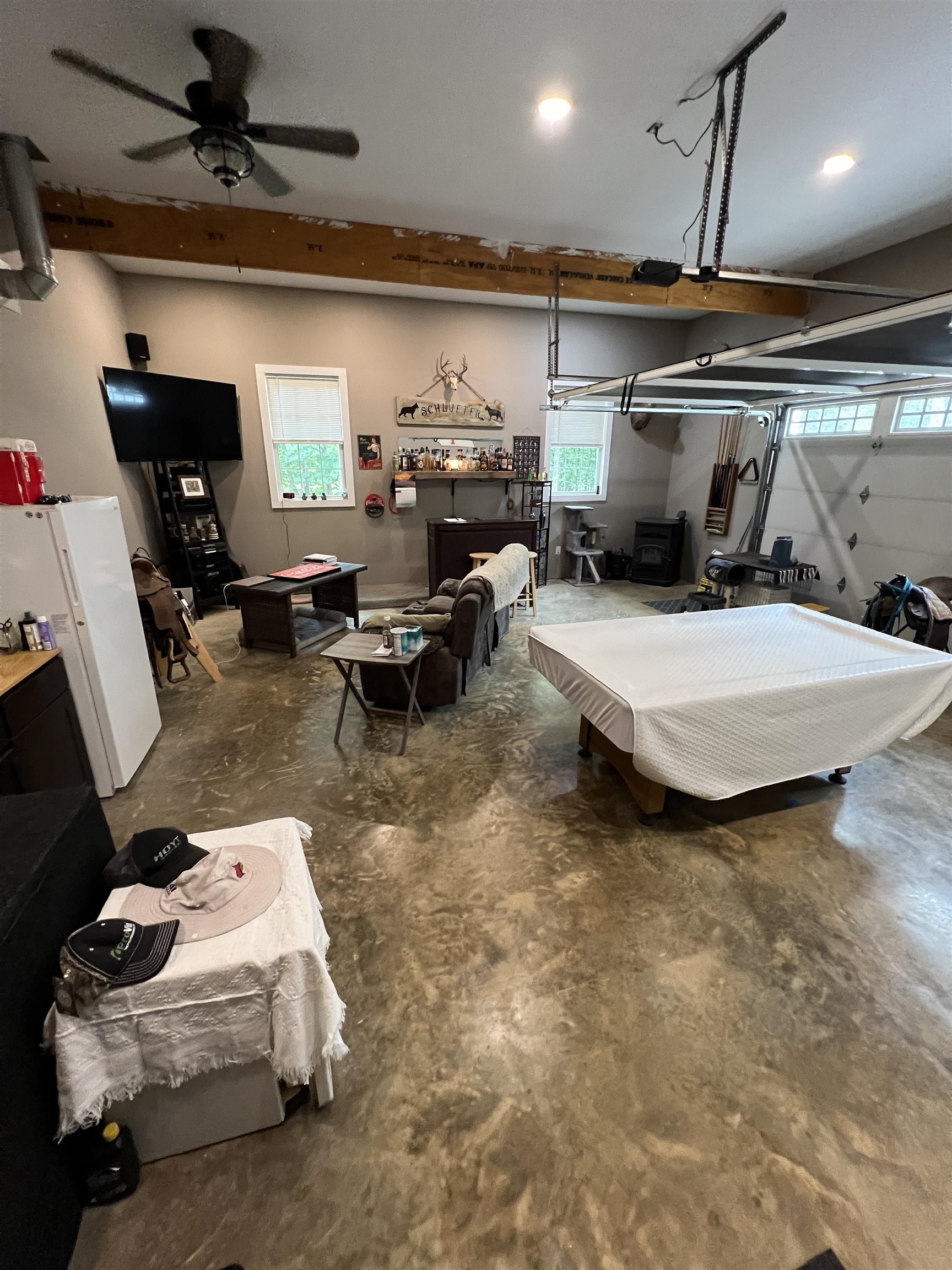 5205 Hamburg Road Michie, TN 38357 - Photo 24 of 40 Playroom featuring a garage, concrete floors, and recessed lighting