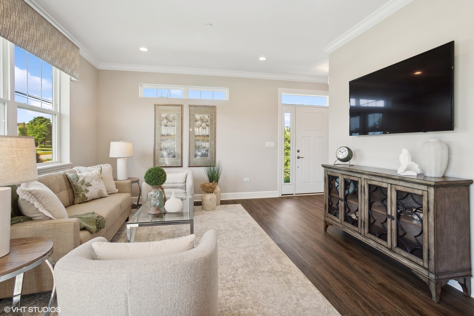 340 Masters Drive Addison, IL 60101 - Photo 3 of 17 a living room with furniture and a flat screen tv