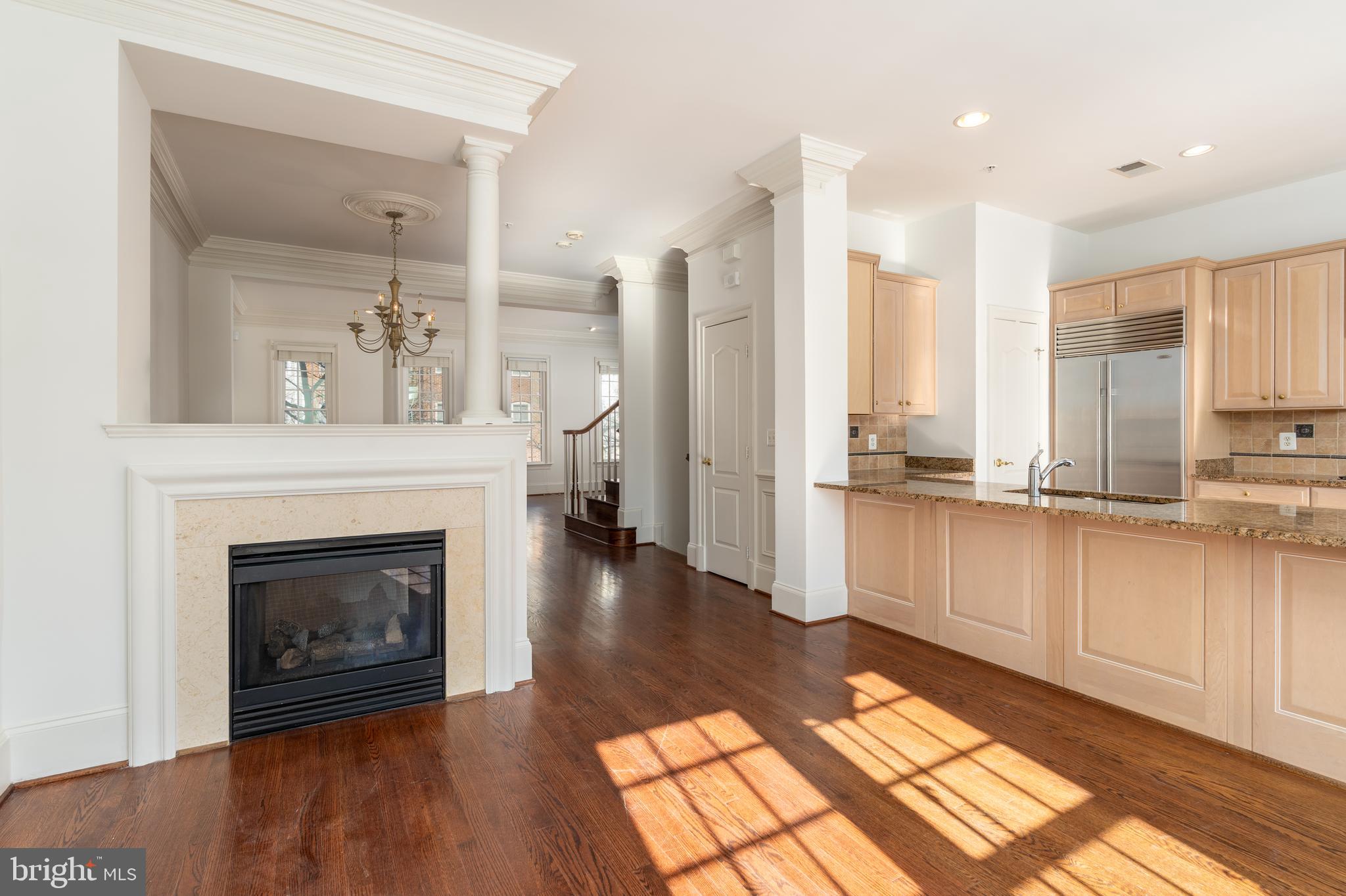 720 Carpenter Road Alexandria, VA 22314 - Photo 11 of 31 Double-sided gas fireplace