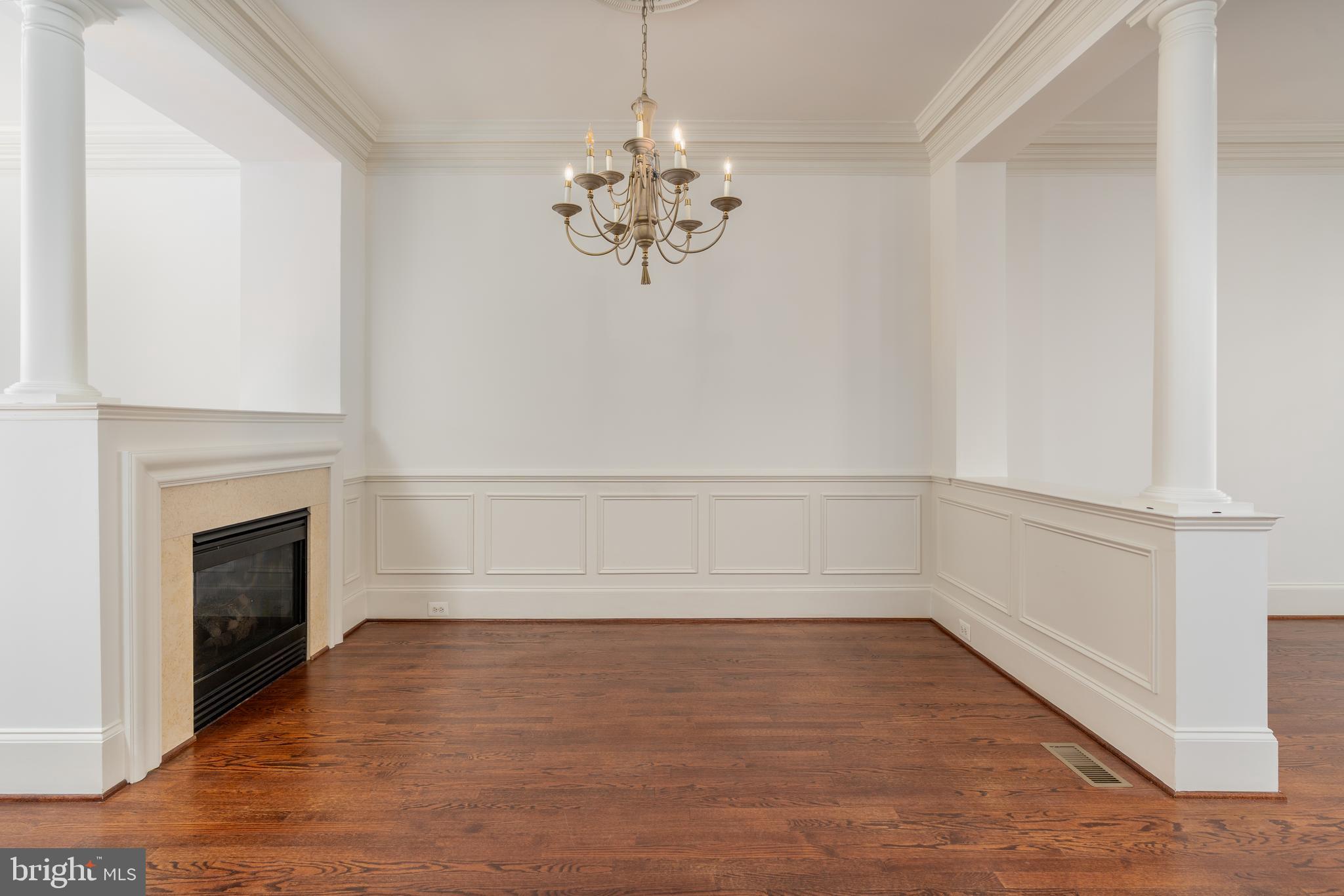 720 Carpenter Road Alexandria, VA 22314 - Photo 6 of 31 Dining room with double-sided fireplace