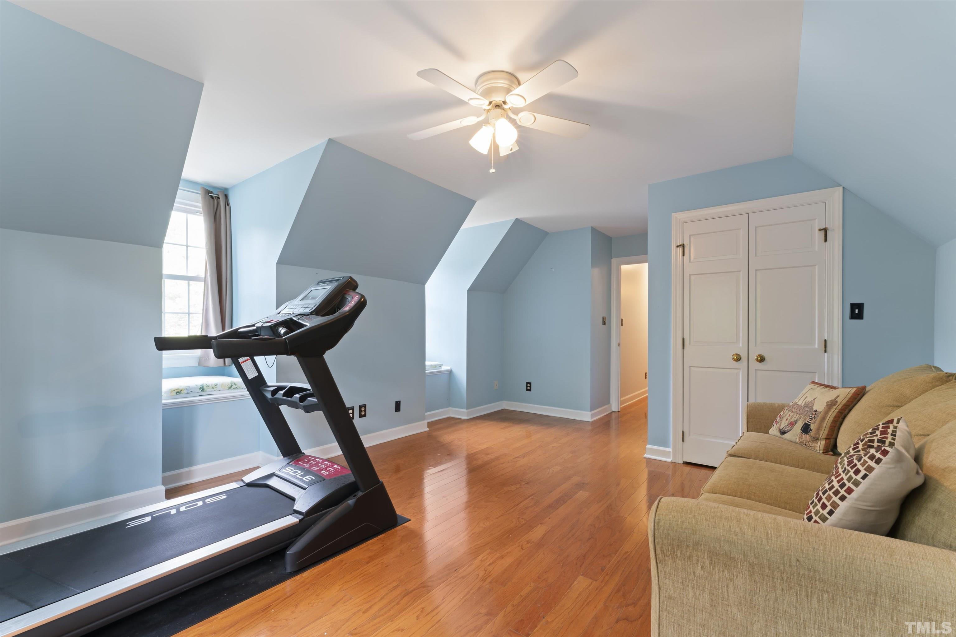 101 Vicksburg Drive Cary, NC 27513 - Photo 25 of 39 a view of a room with gym equipment
