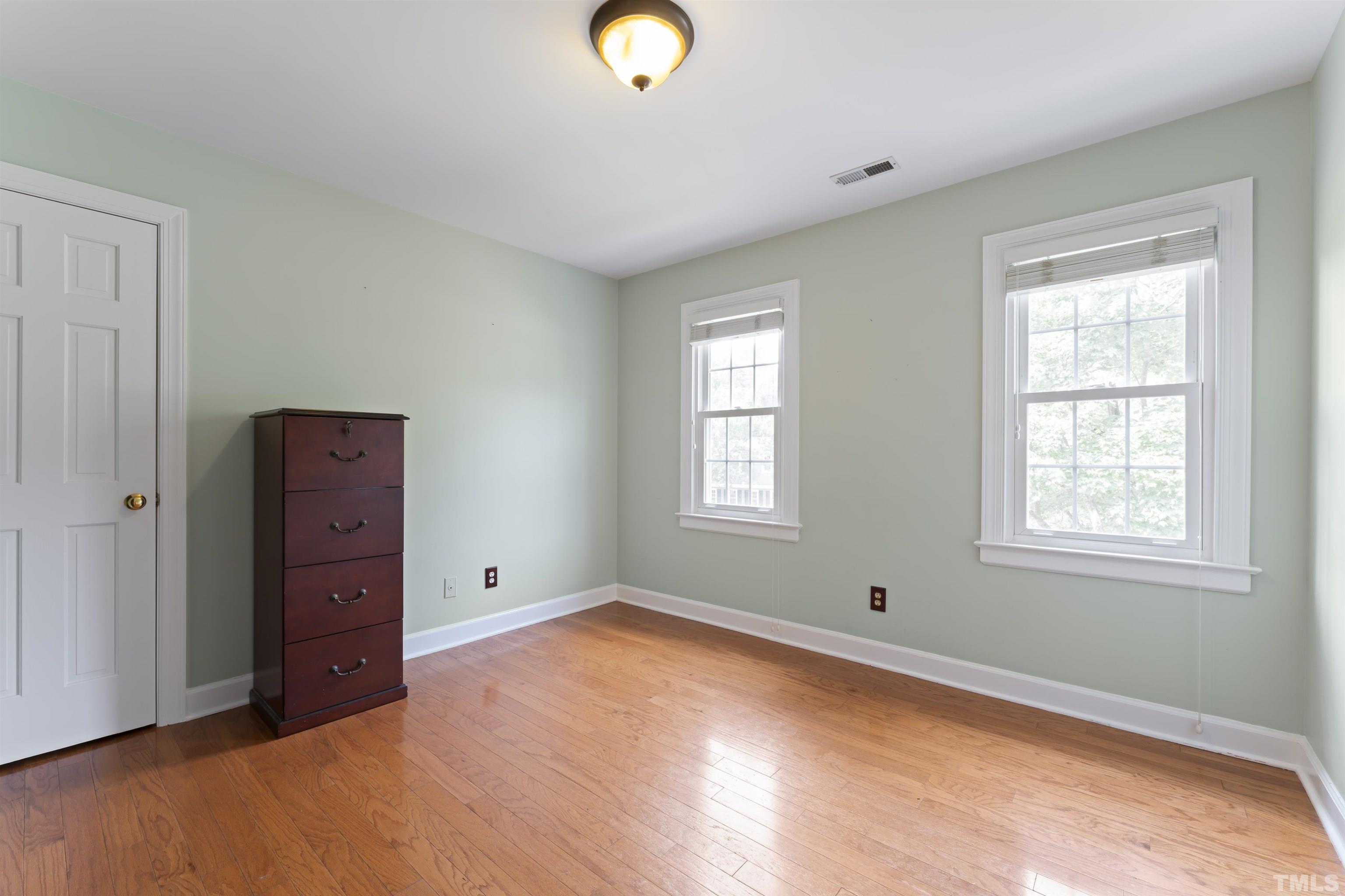 101 Vicksburg Drive Cary, NC 27513 - Photo 29 of 39 a view of an empty room with window and closet area