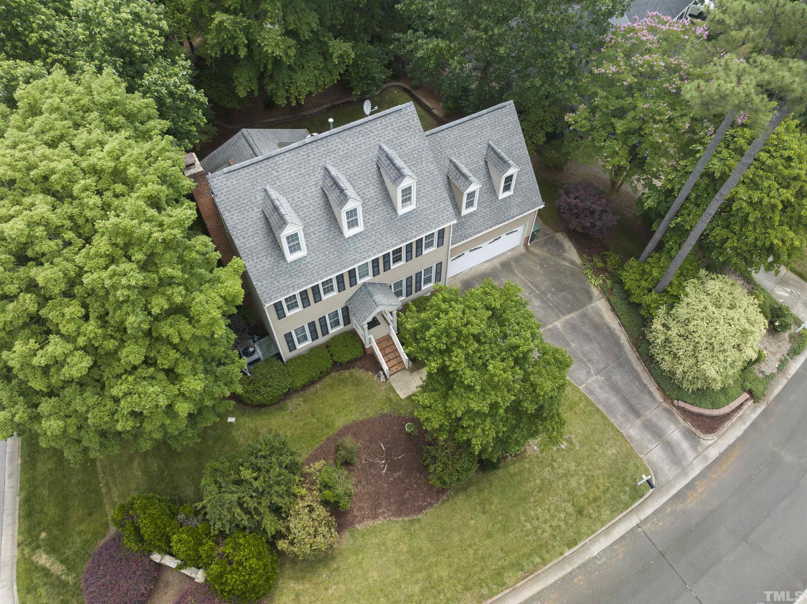 101 Vicksburg Drive Cary, NC 27513 - Photo 36 of 39 an aerial view of a house with garden space and street view