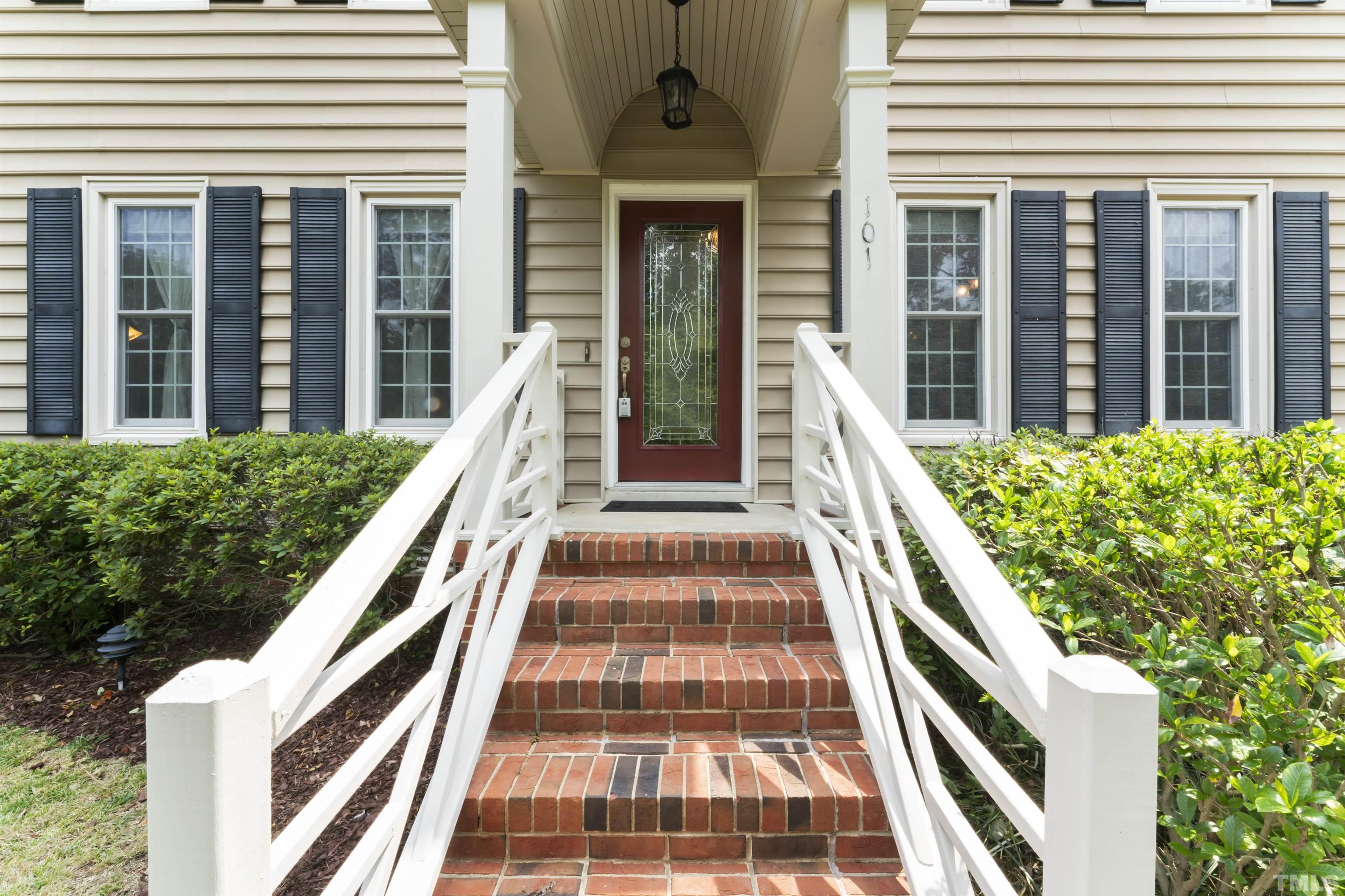 101 Vicksburg Drive Cary, NC 27513 - Photo 8 of 39 a view of a large building with stairs