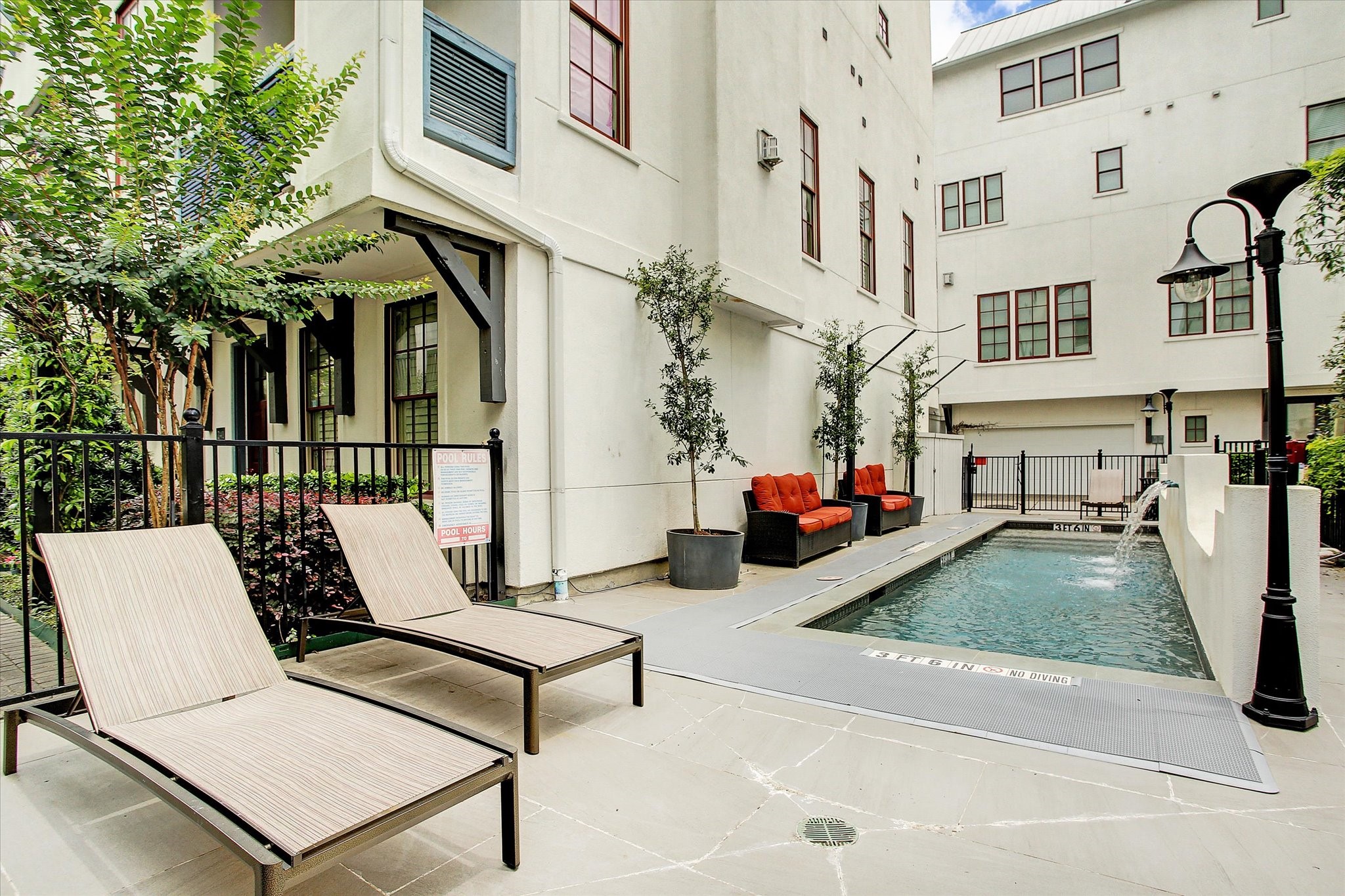 2714 Harvard Street Houston, TX 77008 - Photo 3 of 31 a view of a patio with couches table and chairs and potted plants