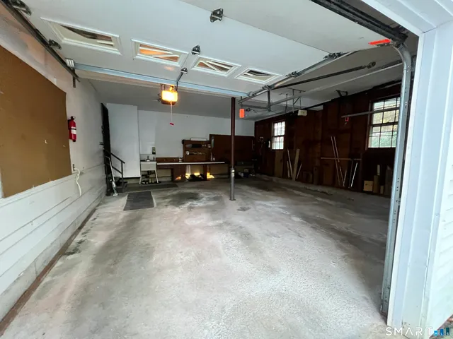 a view of a garage with furniture