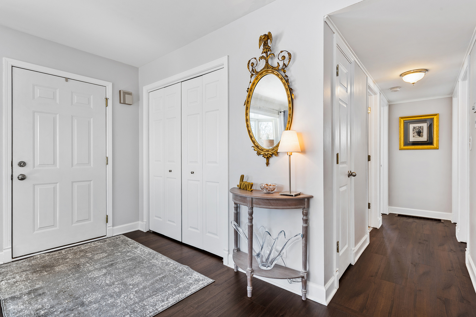 21 Crescent Road Lake Zurich, IL 60047 - Photo 13 of 24 a view of a hallway with wooden floor and entryway