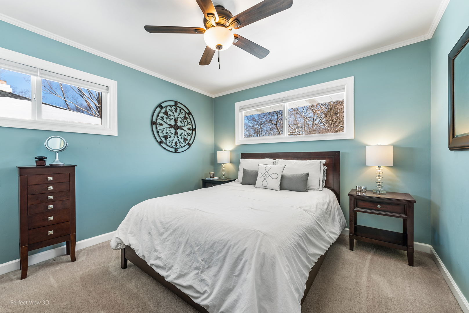 21 Crescent Road Lake Zurich, IL 60047 - Photo 14 of 24 a bedroom with a large bed and a chandelier