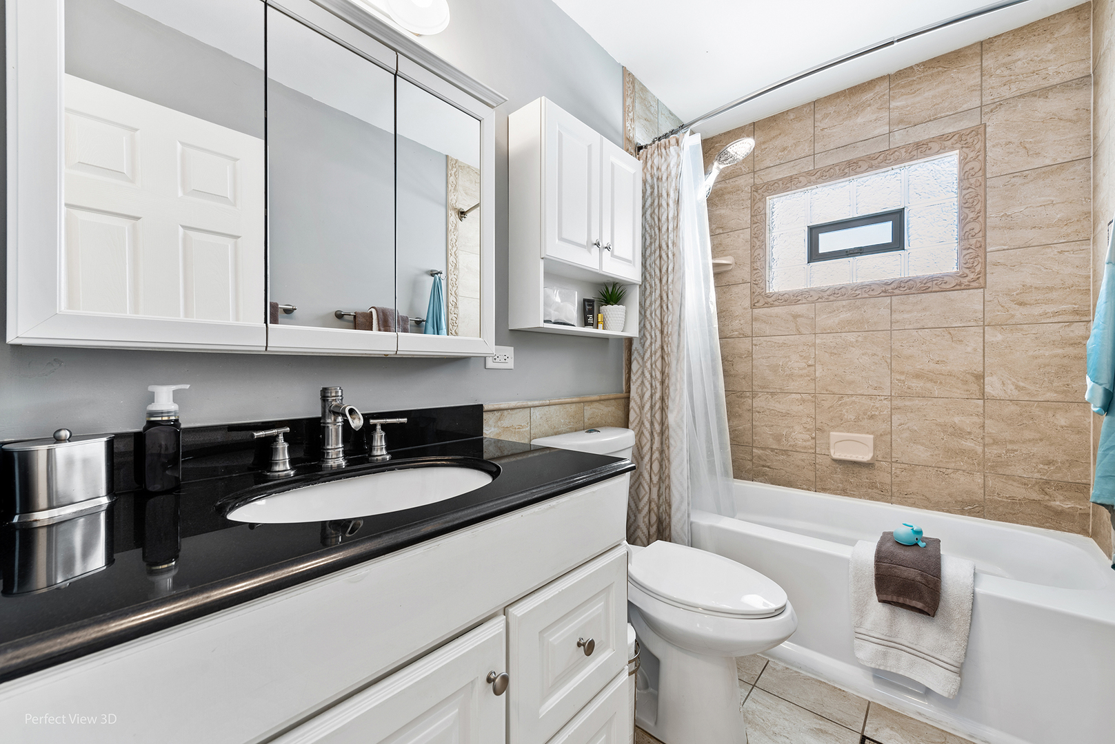 21 Crescent Road Lake Zurich, IL 60047 - Photo 15 of 24 a bathroom with a granite countertop sink a toilet a mirror and shower