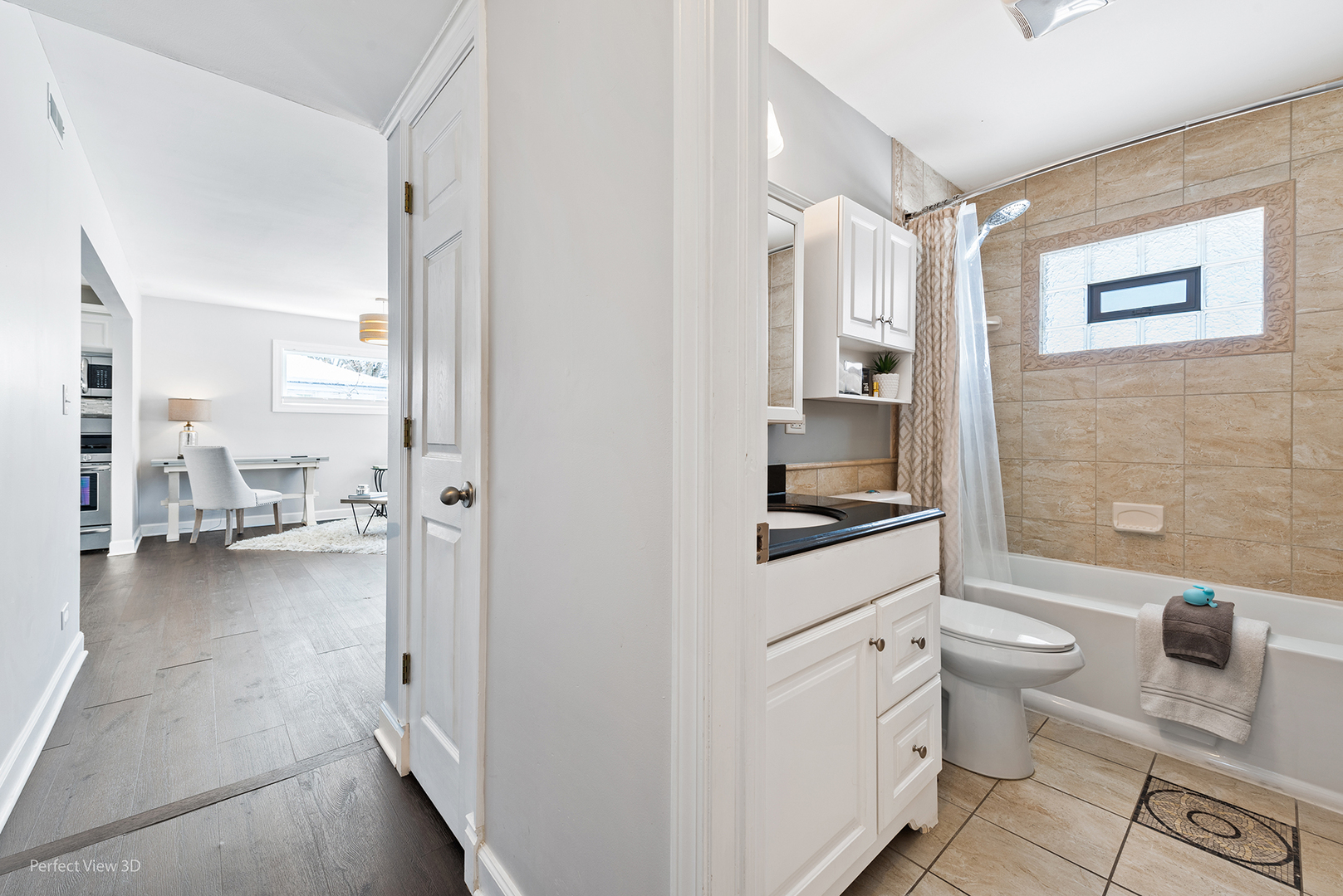21 Crescent Road Lake Zurich, IL 60047 - Photo 16 of 24 a bathroom with a sink a toilet and shower