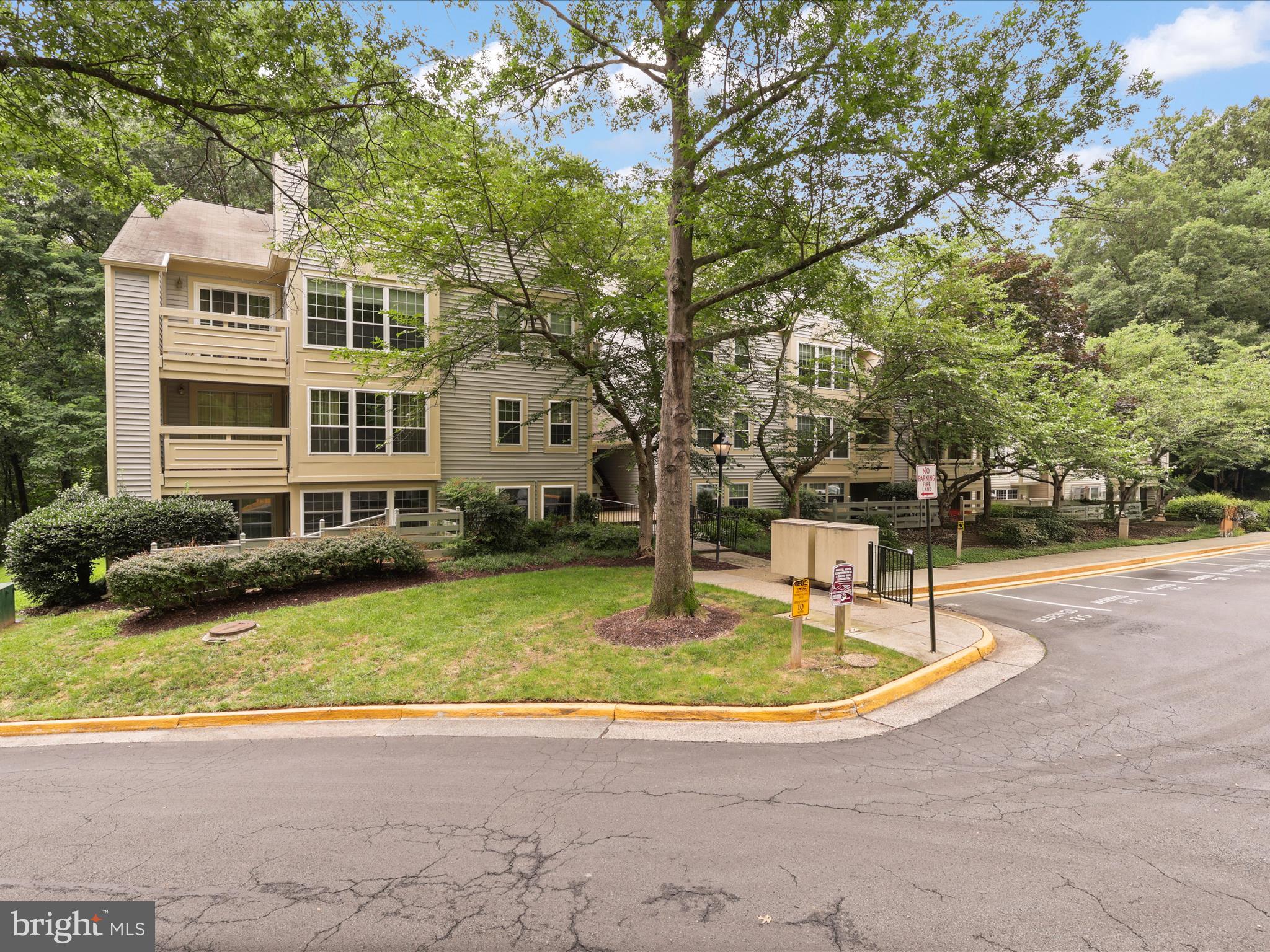 11713 Karbon Hill Court, Unit 710A Reston, VA 20191 - Photo 2 of 19 a view of outdoor space yard swimming pool and patio