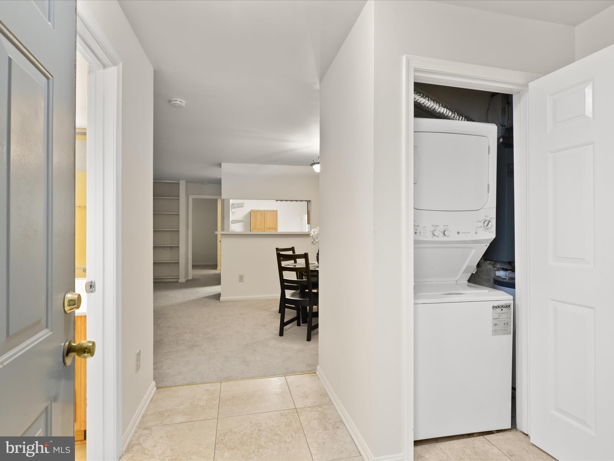 11713 Karbon Hill Court, Unit 710A Reston, VA 20191 - Photo 3 of 19 wooden floor in a gallery