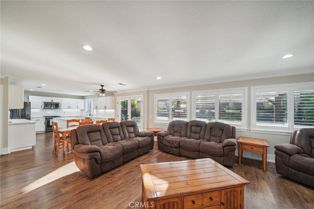 2575 Gilbert Avenue Corona, CA 92881 - Photo 12 of 58 a living room with furniture and a large window