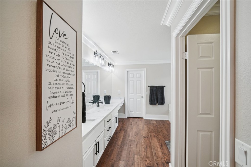 2575 Gilbert Avenue Corona, CA 92881 - Photo 26 of 58 a view of a walk in closet