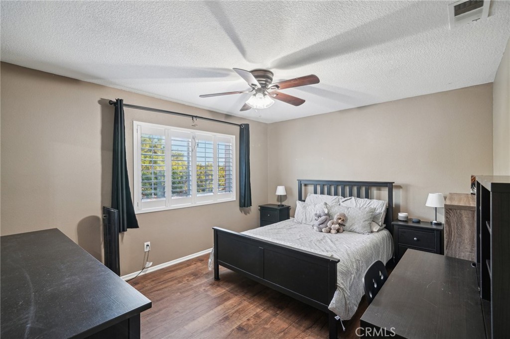 2575 Gilbert Avenue Corona, CA 92881 - Photo 32 of 58 a bed room with a bed and a window