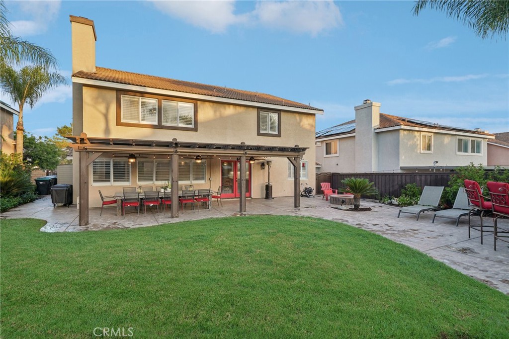 2575 Gilbert Avenue Corona, CA 92881 - Photo 45 of 58 a view of a house with a yard and sitting area