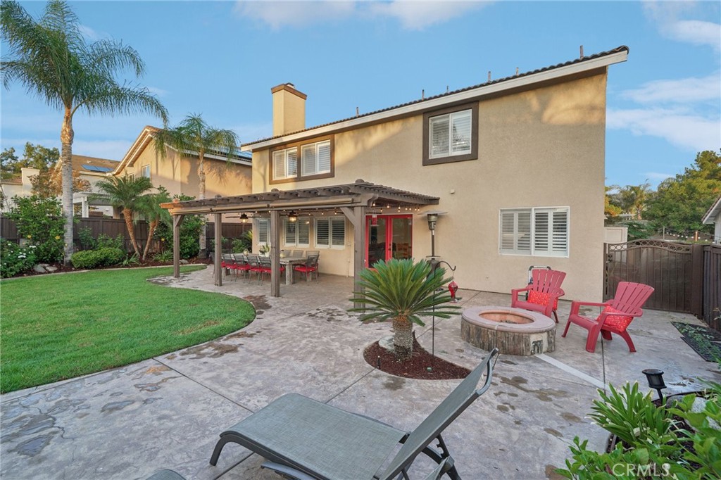 2575 Gilbert Avenue Corona, CA 92881 - Photo 46 of 58 front view of a house with a yard